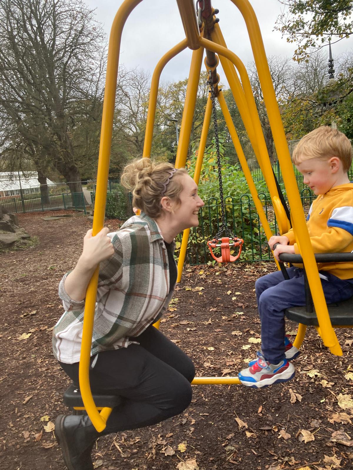 mum and son on a swing